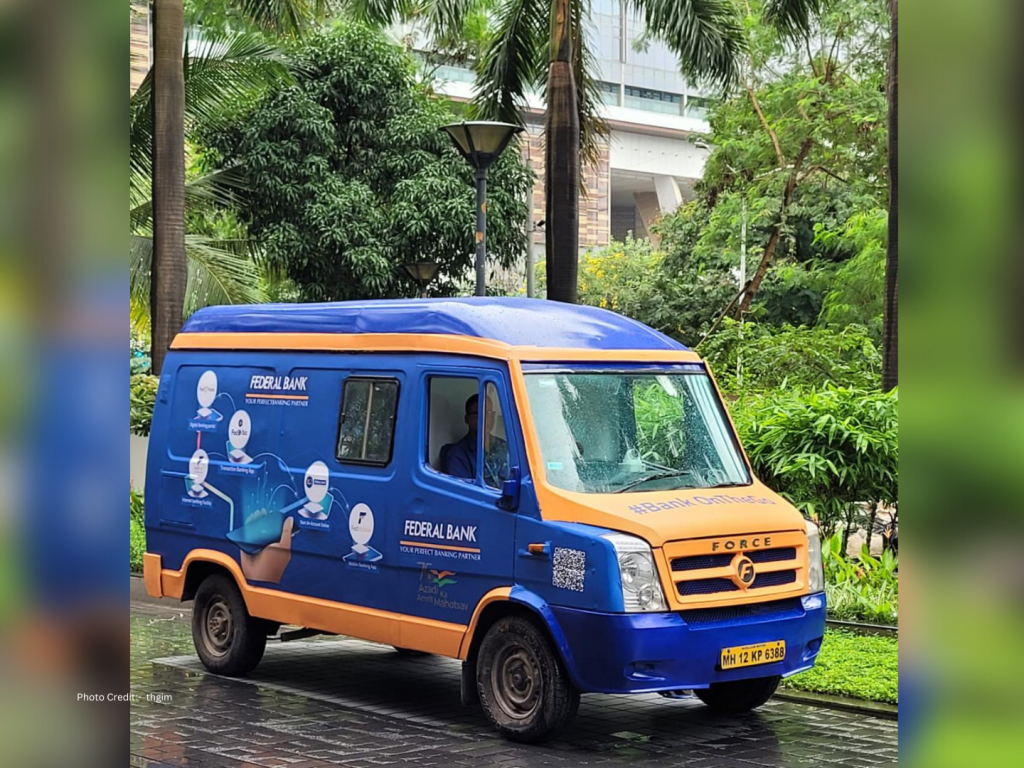 Federal Bank and HDFC bank wheel in banking services on vans